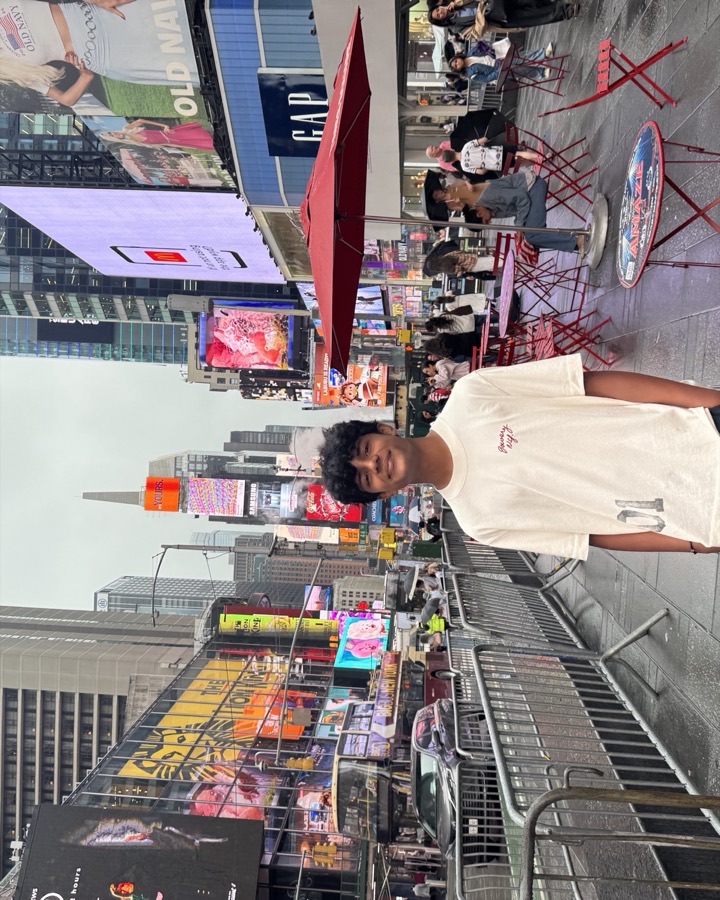 Saarth smiling in Times Square